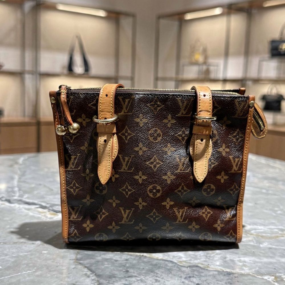 Louis Vuitton women’s Handbag Popincourt Haut Brown Canvas Tan Vachetta Leather